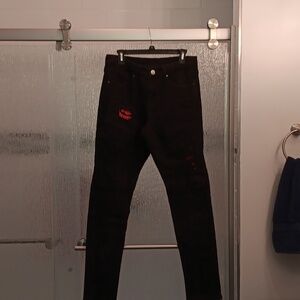 Trendy Black Skinny Jeans with Red Details